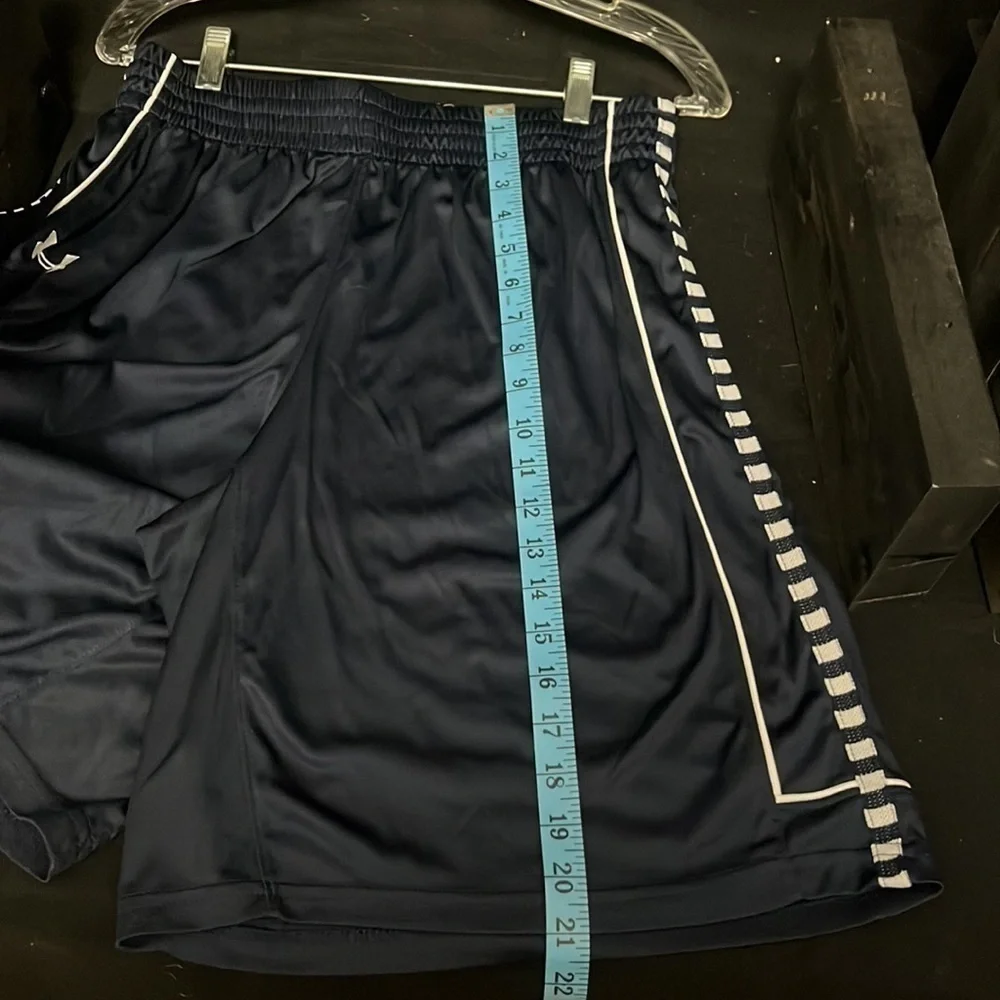 UNDER Armour- navy blue and white polyester athletic shorts